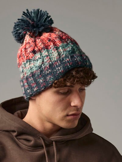 Corkscrew pom pom beanie